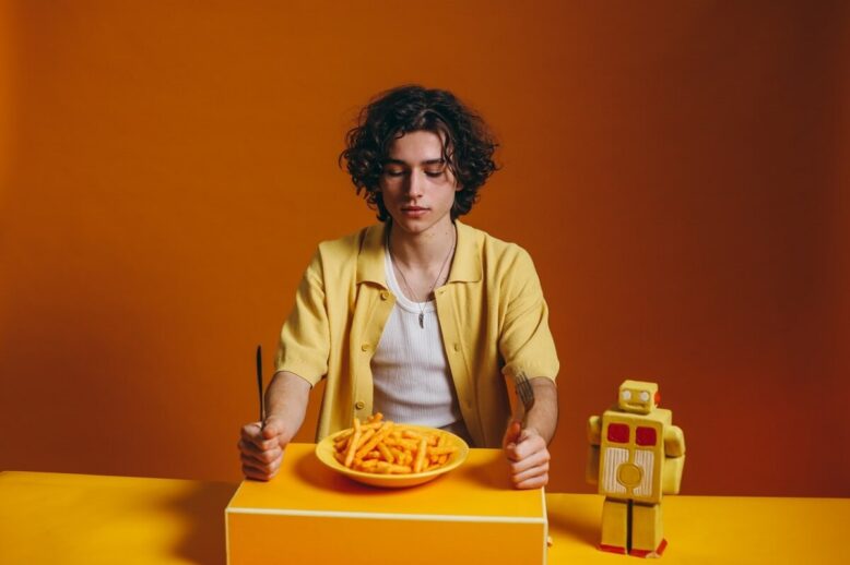 man bored with food 1200 x 800 man with plate of chips looking bored